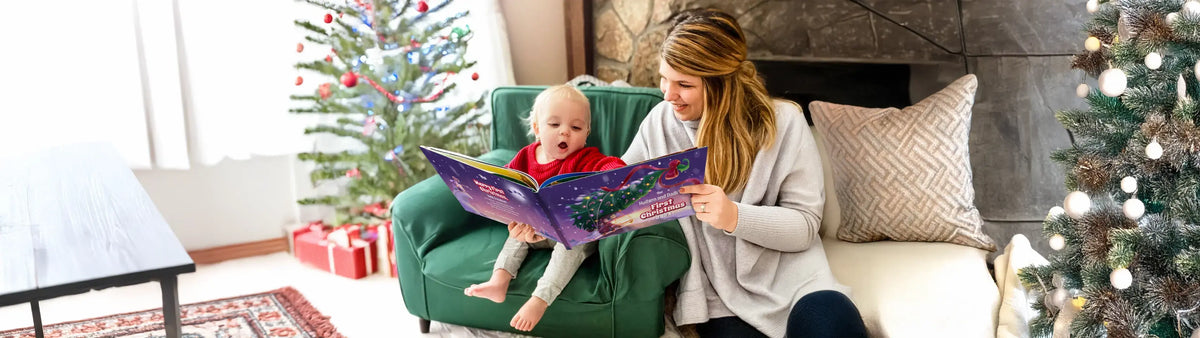 Mom and Baby reading a Book, Christmas Tree in the Background