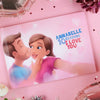 A Personalized book lying on pink table is a romantic gift for girlfriend.