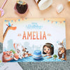 The cover of our bestselling personalized birthday book on the coffee table.