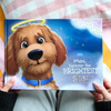 Premium personalized dog memorial book titled "Max, Forever the Brightest Star" with foil text on the cover, honoring a beloved pet with heartfelt stories.