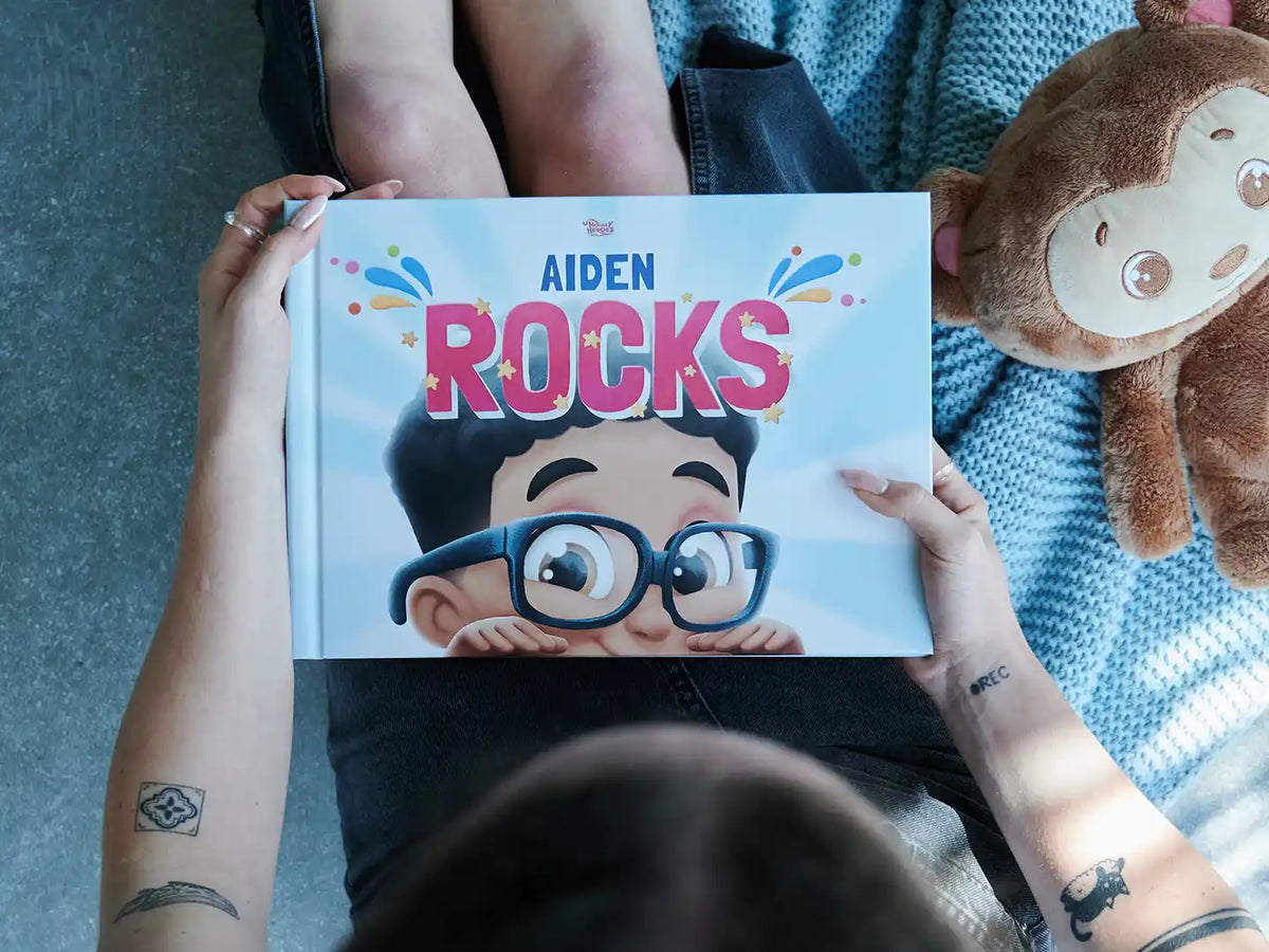 Custom book for a boy, titled Aiden Rocks, with fun personalized cover.