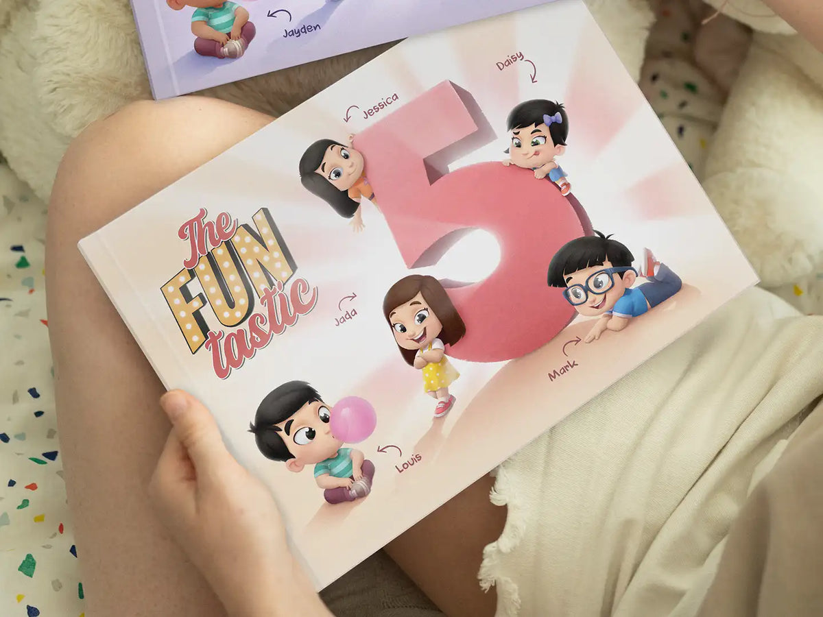 A woman holding a custom book designed for five kids which is a great personalized gift for a family.