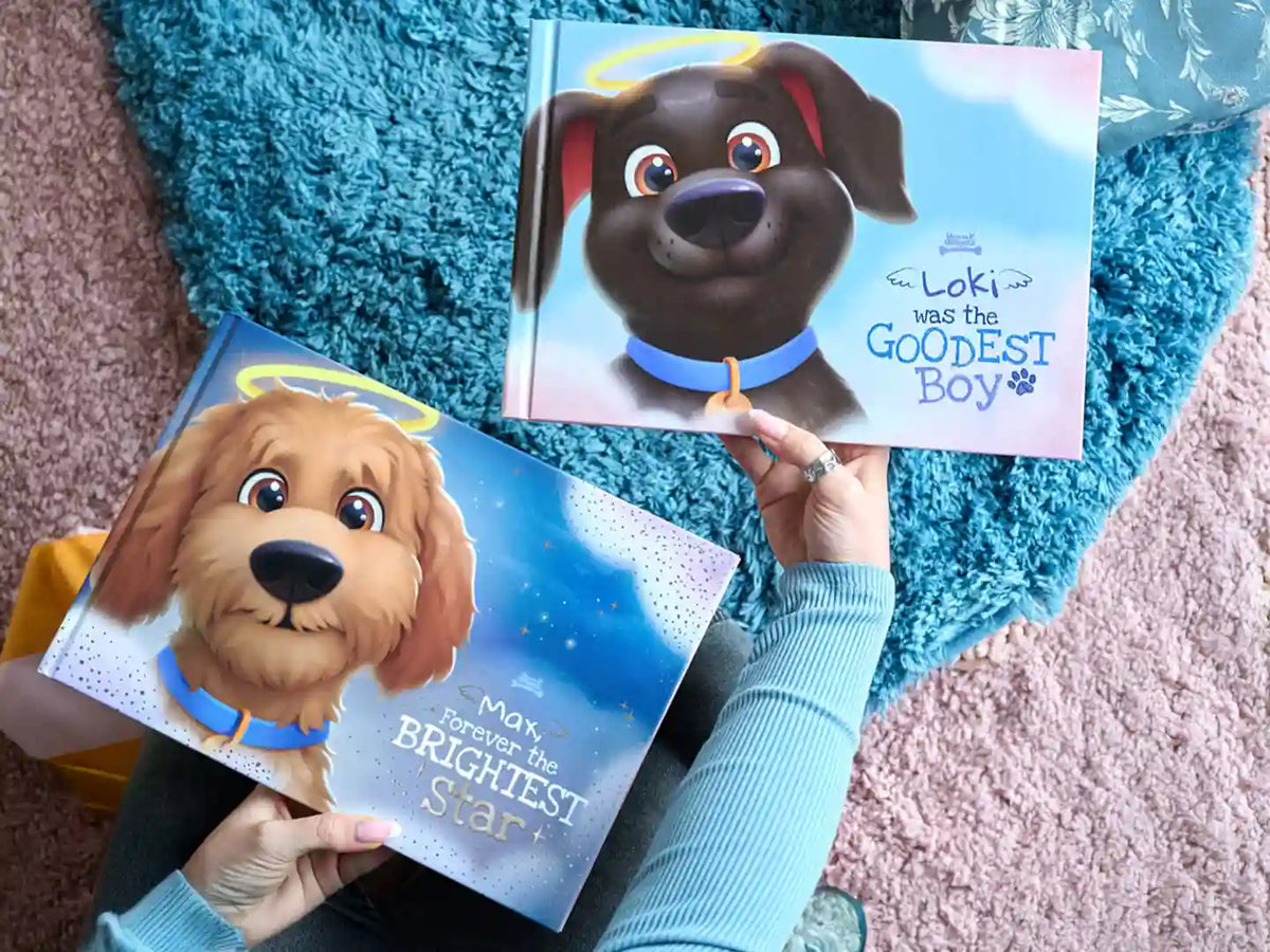 Two custom memorial dog books—"Max, Forever the Brightest Star" and "Loki Was the Goodest Boy"—featuring premium covers and personalized tributes for passed pets.