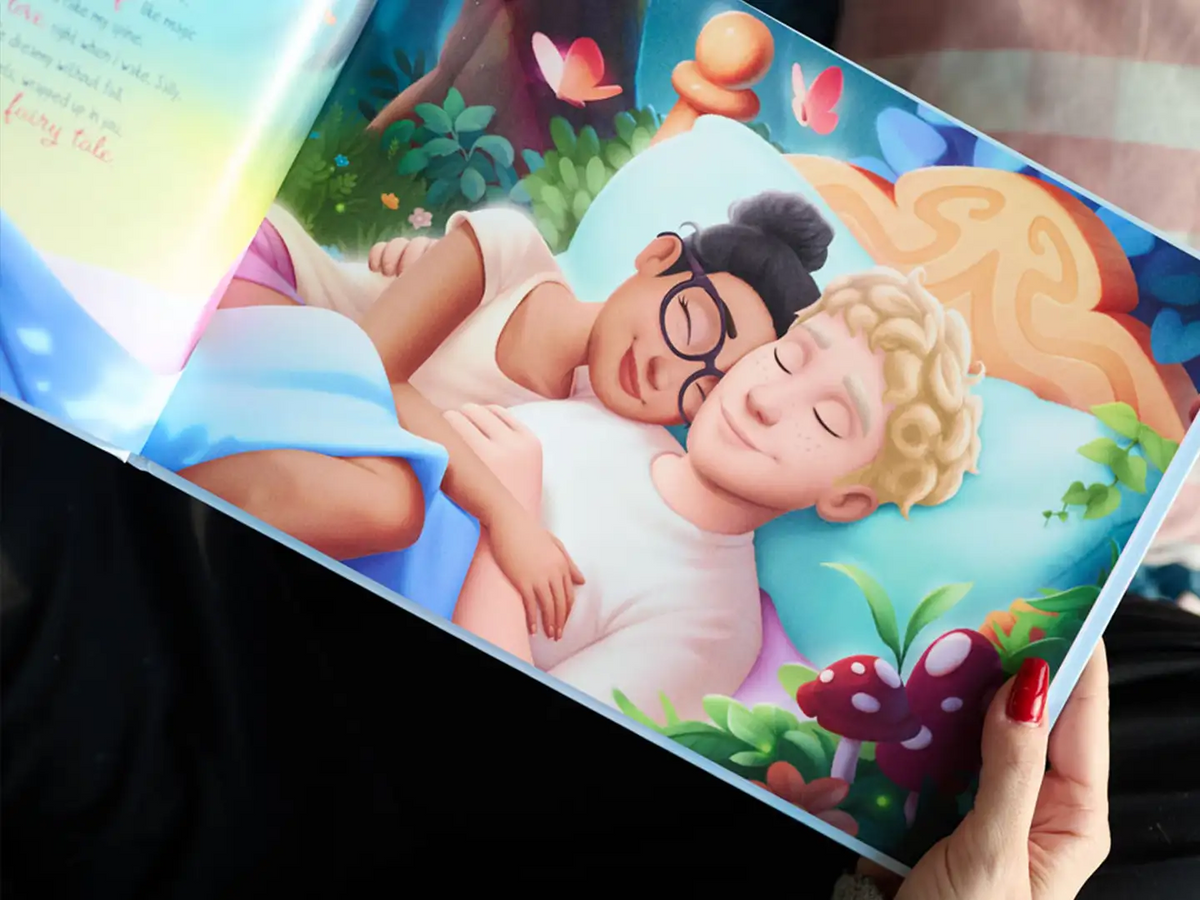 A glimpse inside this personalized love book for couples, featuring a beautiful illustration of a couple cuddling—an unforgettable keepsake to honor your love and cherish special moments together.
