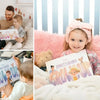 Smiling kids discovering Personalized Daddy Book tailored just for dad and his child.