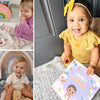 Babies sweetly posing beside their custom baby book, which is a great gift for new families.