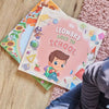 DIY books for kids going back to school are lying on the floor and are a great idea for school starters.
