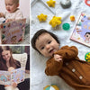 Beautiful smiles of babies with their personalized book they received at birth.
