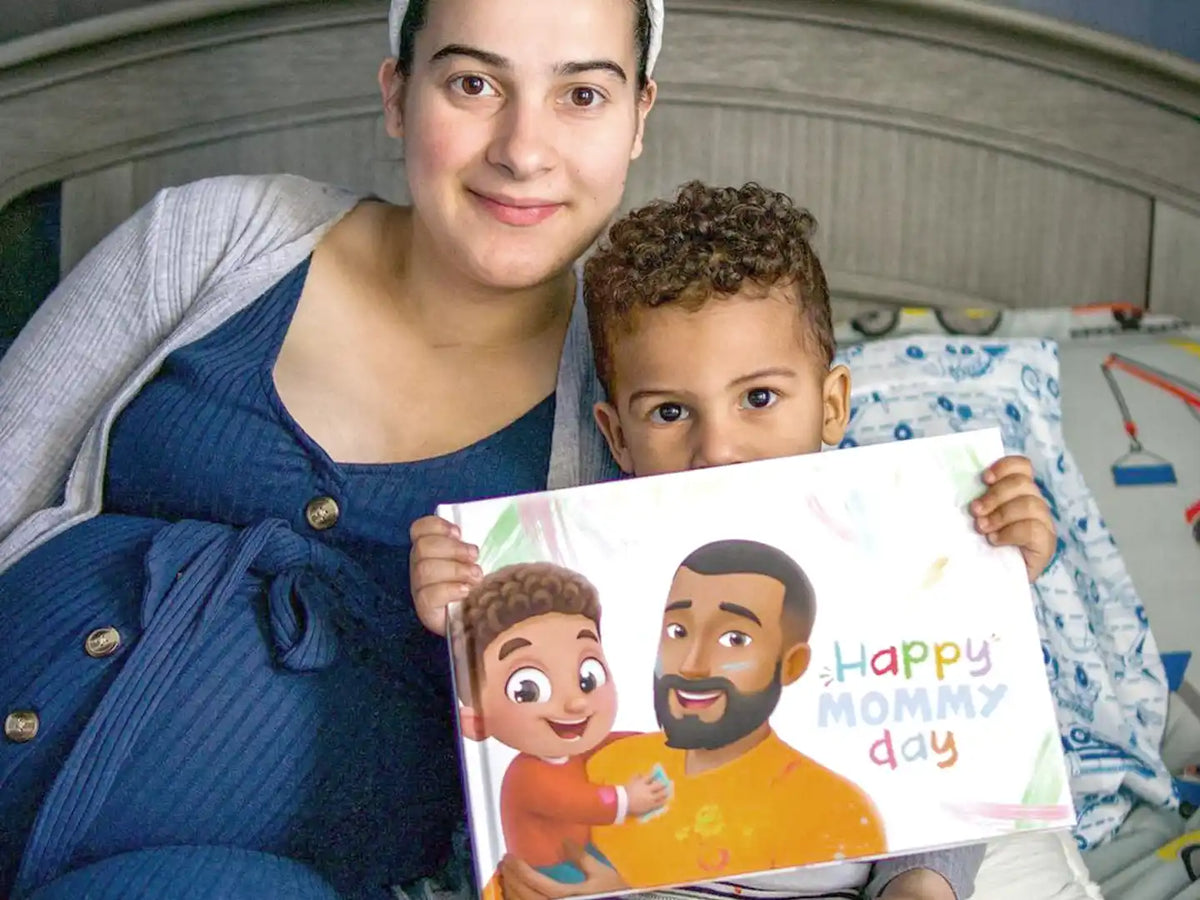 Boy holding his gift for mom, a DIY gift for Mother's Day.