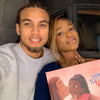 Lovely couple holding their romantic personalized book from Hooray Heroes.
