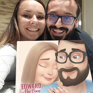 A couple smiling with their very own personalized love book, the best gift for boyfriends or husbands.