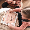 All family can participate reading Hooray Heroes' new personalized book of simple baby songs.