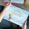 The cover of customized Christmas book with the boy on the cover.