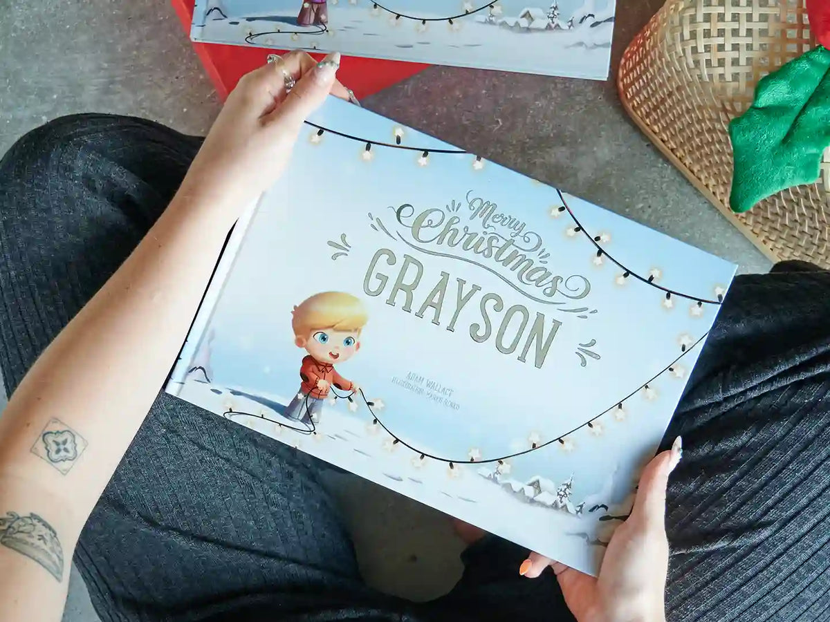 The cover of customized Christmas book with the boy on the cover.