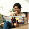 Man reading his custom 'Best Dog Dad' book with his dog — a unique and emotional gift for dog dads.