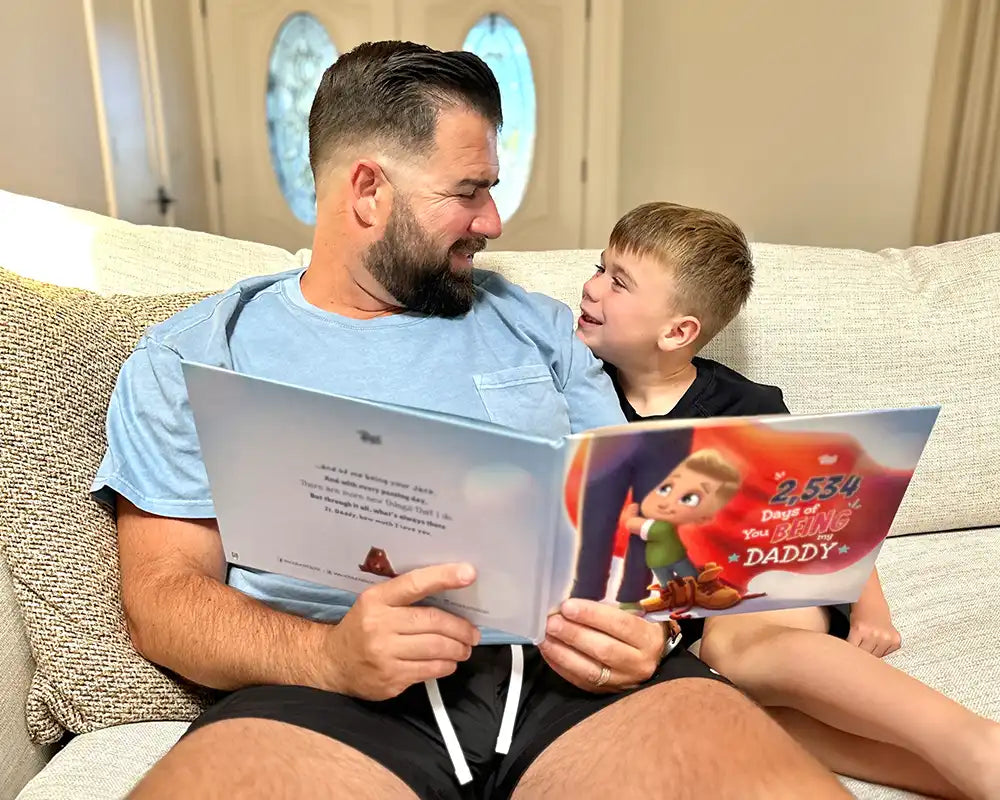 A father and son share a heartwarming moment reading their personalized dad and son book, celebrating the joy of 2,534 days of being a daddy.