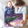 Mother and baby lying in bed holding a personalized Christmas book titled “Lucas and Mom’s First Christmas 2025.”